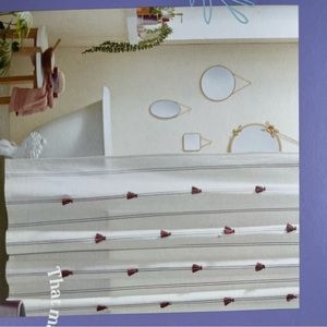 Fabric shower curtain with tassel